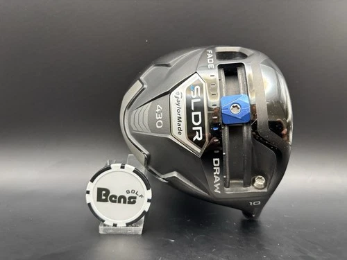 TaylorMade SLDR driver sole, showing the sliding weight rail